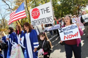 People participate in interfaith march and rally for comprehensive immigration reform in 2013