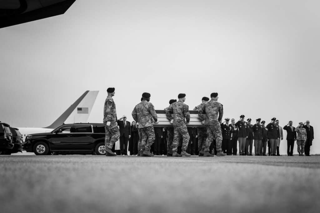 President Donald J. Trump and First Lady Melania Trump attend the Dignified Transfer of remains of six U.S. soldiers killed in an Iranian drone strike in Kuwait, Saturday, March 7, 2026, at Dover Air Force Base, Delaware. (Official White House Photo by Daniel Torok)