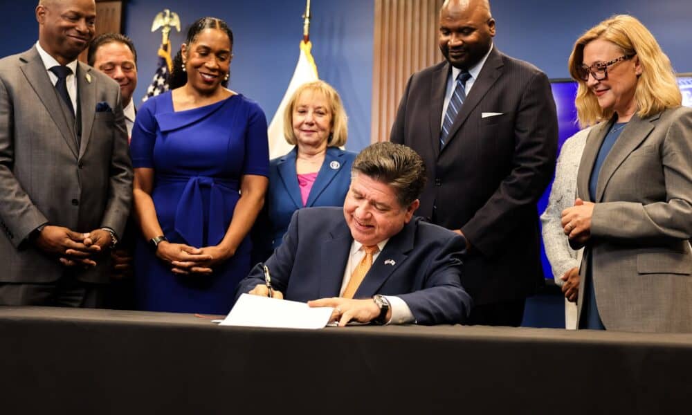 Governor Pritzker signs Illinois' eighth consecutive balanced budget.