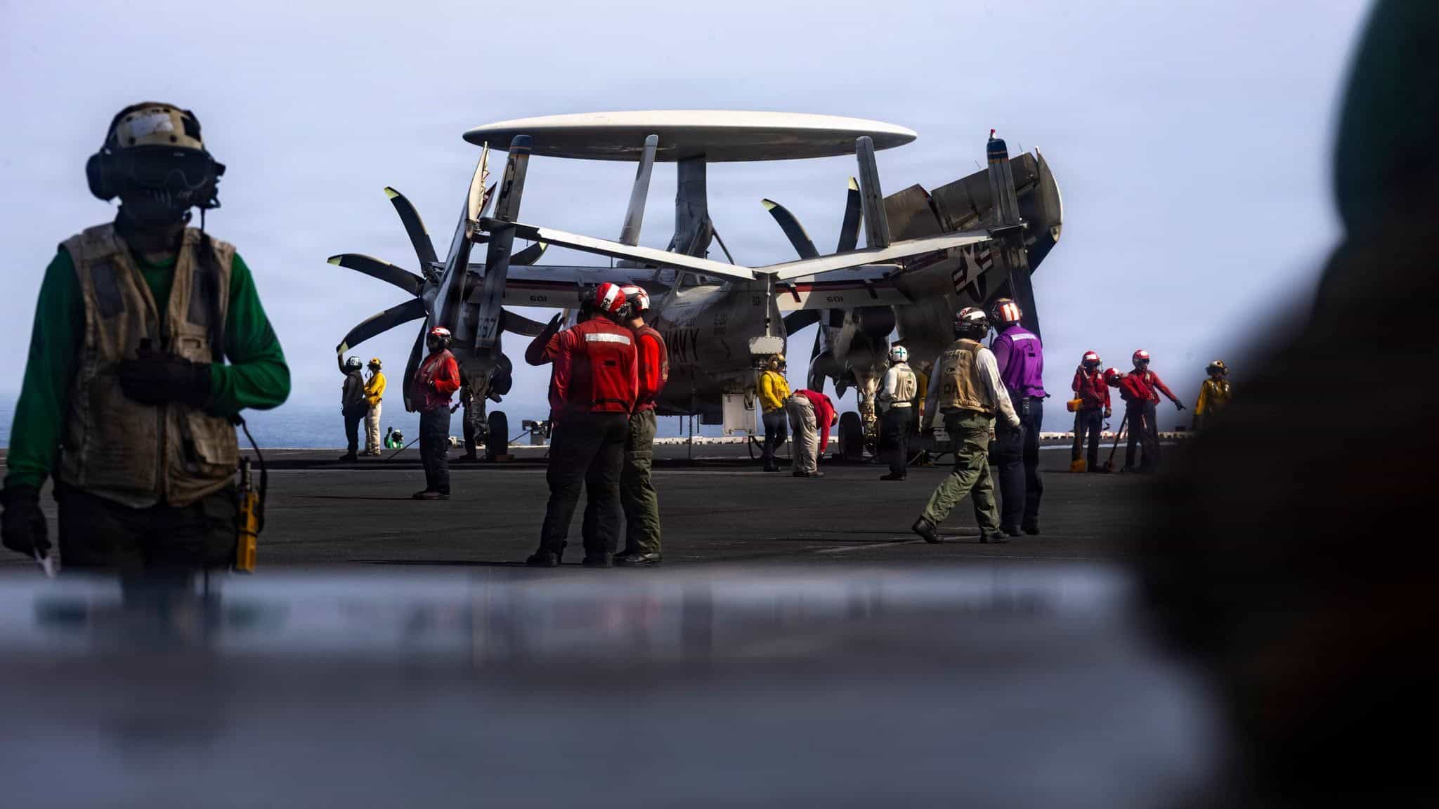 U.S. Sailors prepare for flight operations on the flight deck of Nimitz-class aircraft carrier USS Abraham Lincoln (CVN 72), June 23, 2026. Abraham Lincoln is deployed to the U.S. 5th Fleet area of operations to support maritime security and stability in the Middle East. (U.S. Navy photo)